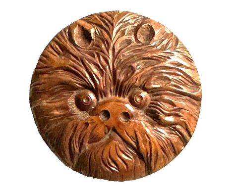 1 Large 19th century Paris backmarked dog button. This finely detailed and carved wood button depicts a Pekinese dog and is b