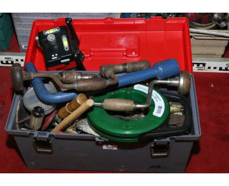 A tool box of various hand tools to include braces and bits, screw drivers, tape measures, spanners etc, along with a 'Forge 