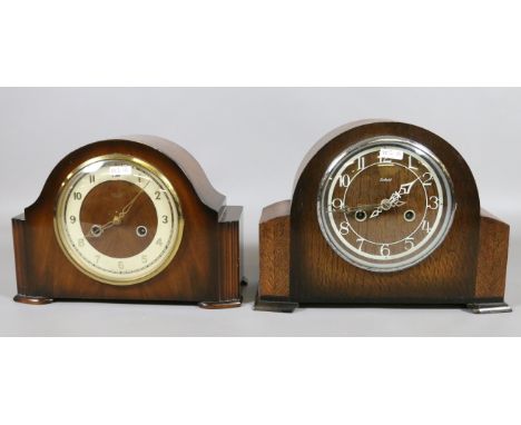 An oak cased Enfield mantel clock chiming on a coiled gong along with a Smith walnut cased clock (AF).