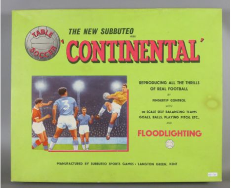 A boxed continental Subbuteo table soccer set.