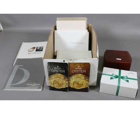 A collection of Rolex Oyster catalogues and price lists along with other timepiece manufacturers books and a Patek Philippe w