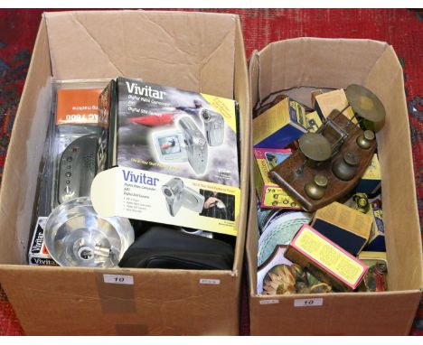 Two boxes of miscellaneous to include Post Office scales and weights, boxed Matchbox diecast toy cars, Wedgwood Millenium cup
