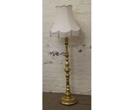 A gilt wood standard lamp and shade.
