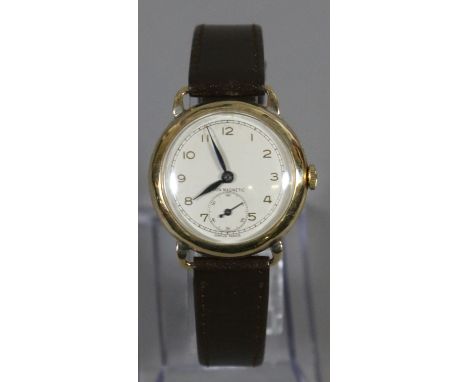 A gentleman's vintage 9ct gold cased manual Rotary wristwatch with Arabic numeral markers and subsidiary seconds, assayed Lon