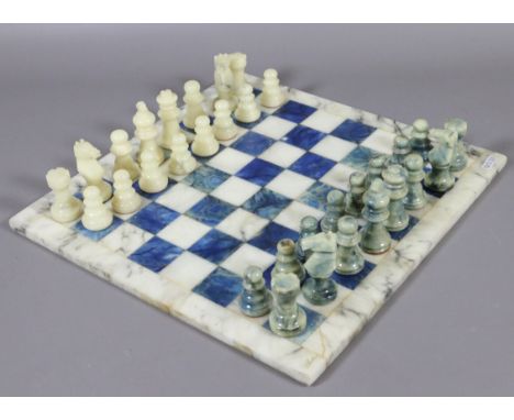 A Chiellini C.A & A alabaster chess set and board.