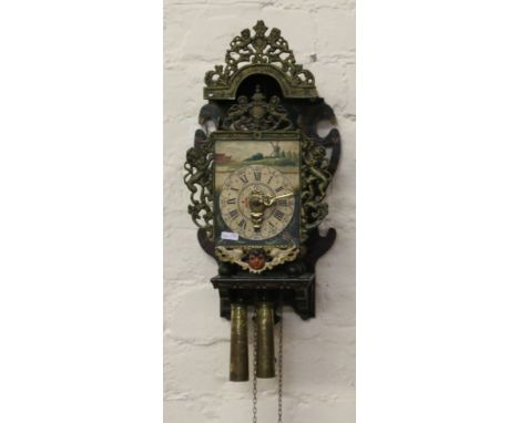 A C20th Dutch lantern clock on bracket.