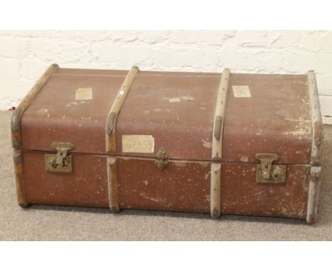 A canvas wooden bound travel trunk and contents of an aluminium jam pan.