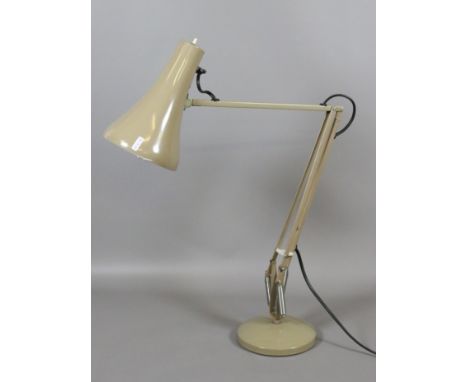 An adjustable anglepoise reading lamp. 