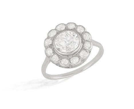 AN EARLY 20TH CENTURY DIAMOND RINGOf target design, the cluster centring a European-cut diamond weighing approximately 1.60ct