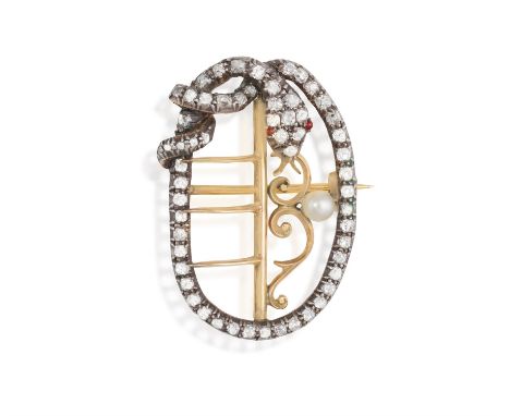 A 19TH CENTURY DIAMOND BUCKLE BROOCHModelled as a stylised buckle, the oval-shaped diamond frame with wrapped around snake, s