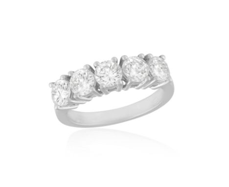 A DIAMOND FIVE-STONE RINGThe frontispiece set with five brilliant-cut diamonds, within claw-setting, to a plain hoop, mounted