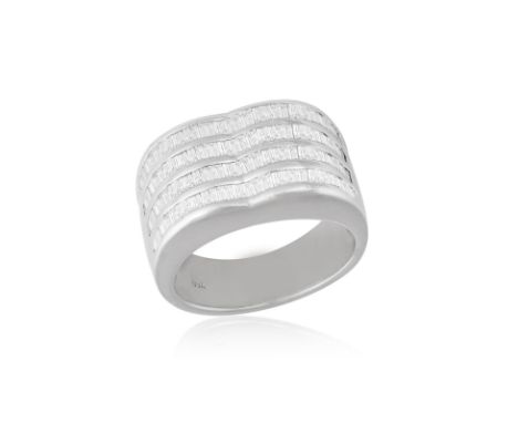 A DIAMOND RING  Of broad undulating design, channel-set to the front with baguette-cut diamonds, mounted in 18K gold, diamond