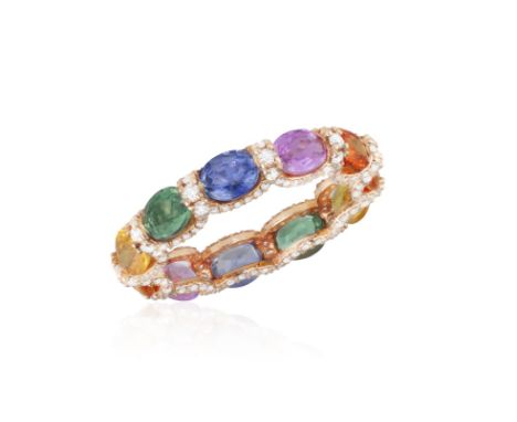 A MULTI-COLOURED SAPPHIRE AND DIAMOND ETERNITY RINGThe continuous row of oval-shaped sapphires of various tints, including pi