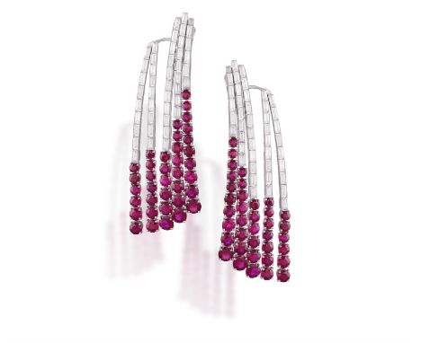 MICHELE DELLA VALLE: A PAIR OF RUBY AND DIAMOND PENDENT EARCLIPSEach designed as a cascade of baguette-cut diamonds ending wi