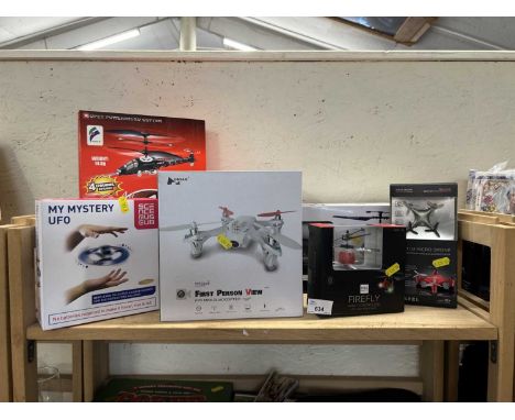 A quantity of remote control flying vehicles to include First Person View FPV Mini Quadcopter and others
