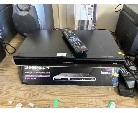 Panasonic HDD recorder together with a box of various cables