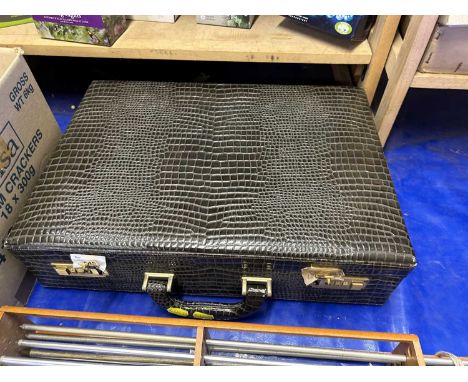A mock croc style briefcase by John Bennett of London and similar folio cover