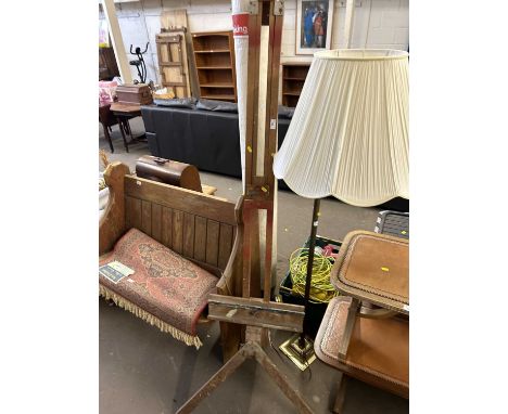 A wooden folding artists easel