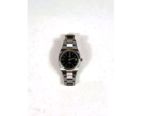 A vintage gents Zenith Defy automatic watch, stainless steel case, original stainless steel strap, baton marks, black dial 