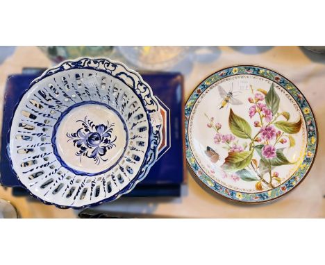 A Royal Worcester hand painted plate with flowers and insects, embossed floral boarder (hairline) 23cm, two other dishes 