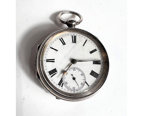 A hall marked silver open faced pocket watch with white enamel dial 