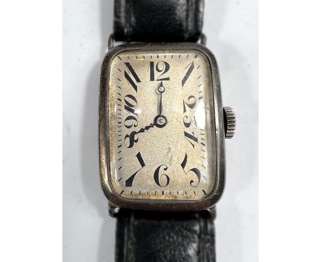 An unusual white metal cased Art Deco gents wristwatch with stretcher Arabic numerals on later strap.Lot 714H - On inspection
