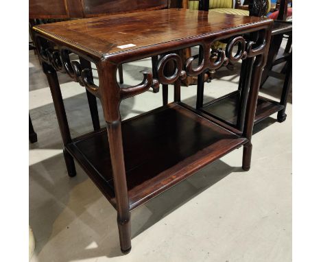 A 19th century Chinese hardwood rectangular table with carved detail stepped legs and under lower shelf, 60x46x50cm&nbsp; 