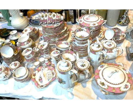 A large Royal Albert Lady Carlyle tea and coffee service with tea and coffee pots, serving dishes, cups and saucers etc.Lot 5