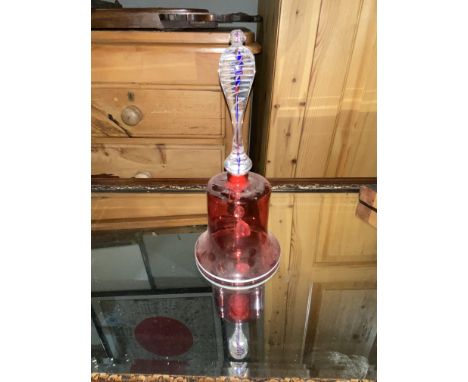 A Victorian cranberry glass bell with white enamel to rim 