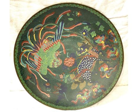 A cloisonné large circular wall plaque depicting fighting cock and dog, diameter 46cm (some enamel loss)  