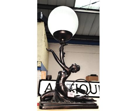 An Art Deco style bronzed effect table lamp, girl with glass globe overall height including globe approx. 50cm 