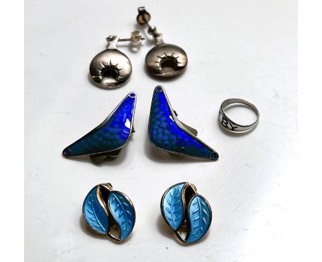 Three pairs of Scandinavian enamel clip on white metal earrings 