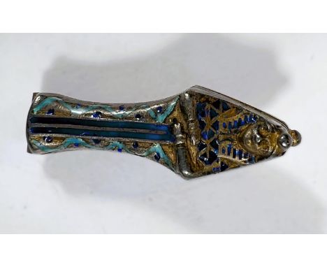 An unusual gilt and enamel sarcophagus with tiny opening to show entombed figure, (brooch pin to reverse broken a.f) 