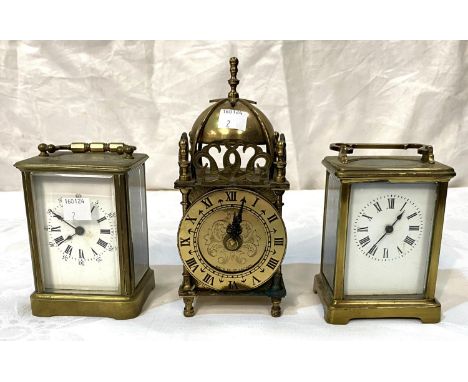 Two late 19th century brass carriage clocks; a reproduction lantern clock 