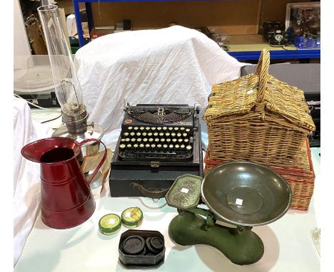 A vintage Remington portable typewriter, sewing baskets etc 