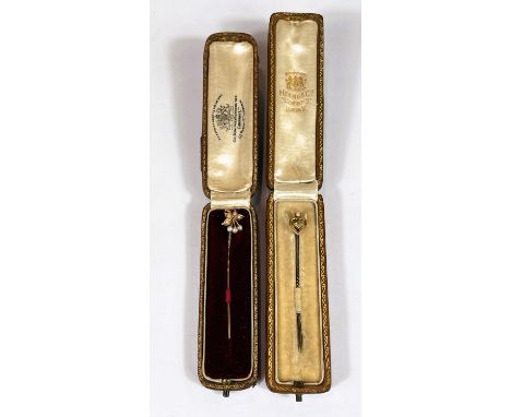 Two cased gold stick pins in original boxes 