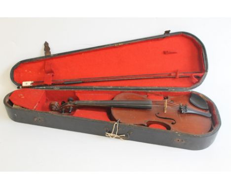 A GERMAN MADE VIOLIN WITH TWO PIECE BACK, label inside reading - "Copie of Antonius Stradivarius Cremonenlis Faciebat Anno 17