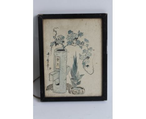 A FRAMED AND GLAZED COLOURED PRINT OF ORIENTAL INTEREST