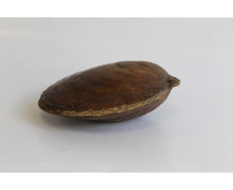 A LARGE FOSSILISED CLAM SHELL, mottled light brown surfaces  21 cm x 20 cm