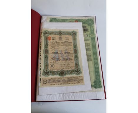 A LONDON SCRIPOPHILY CENTER LIMITED FOLIO ALBUM, containing a collection of share certificates, mainly of Russian and Chinese