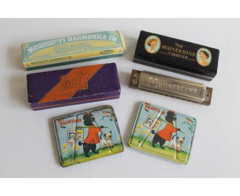 A BOXED HOHNER BRAND HARMONICA, together with three others and two small paint boxes. 