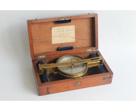 A LACQUERED BRASS J.B. DANCER OF MANCHESTER COMPASS, with silvered dial on brass bracket with folding sites and levels. In fi