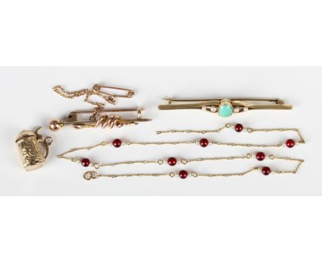 A gold, turquoise and seed pearl bar brooch, collet set with the oval turquoise between two pairs of seed pearls, detailed '1