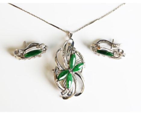 A white gold, jade and diamond pendant brooch, unmarked, weight 8.8g, length 5cm, with a white gold neckchain, detailed '14K'