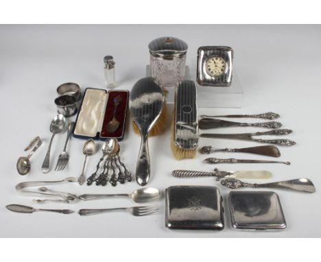 A small collection of silver and silver mounted items, including a George V cigarette case, Birmingham 1918, a mother-of-pear