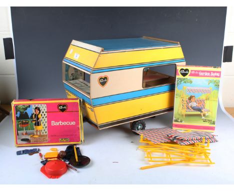 A collection of Palitoy Sindy items, including a Range Rover car, a caravan, stables, barbecues, a swimming pool and a horseb