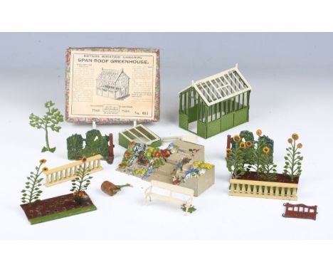 A Britains No. 053 span roof greenhouse, complete with staging and six trays of plants, boxed, together with a cold frame, va