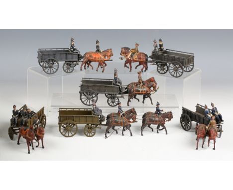 Ten Britains lead army horse-drawn wagons and figures, another wagon and a horse-drawn limber and cart (playwear, faults, pai