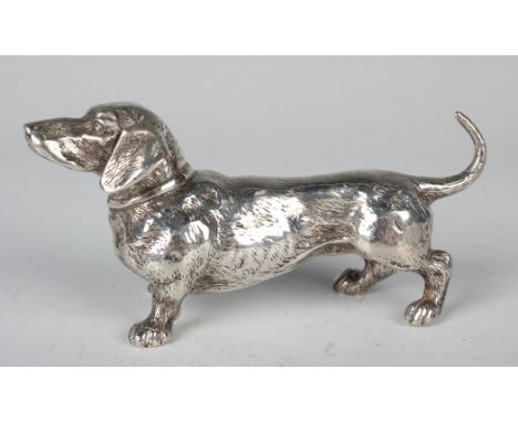 An Edwardian silver model of a dachshund with realistic detailing, import mark Chester 1907 by Arthur Graf, weight 112g, leng