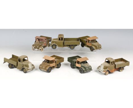 Four Britains Beetle lorries and three No. 1334 army tipper lorries (some playwear, paint chips and repainting).Buyer’s Premi
